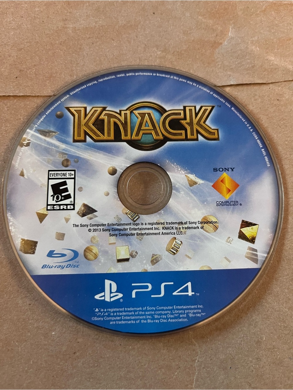 Sony PS4 Knack Game Disc in Blue and Gold Artwork- no case